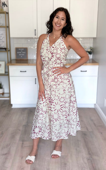 Flowy midi dress on model (5'8", Size Small, Bust 37"), featuring halter neckline and defined waist