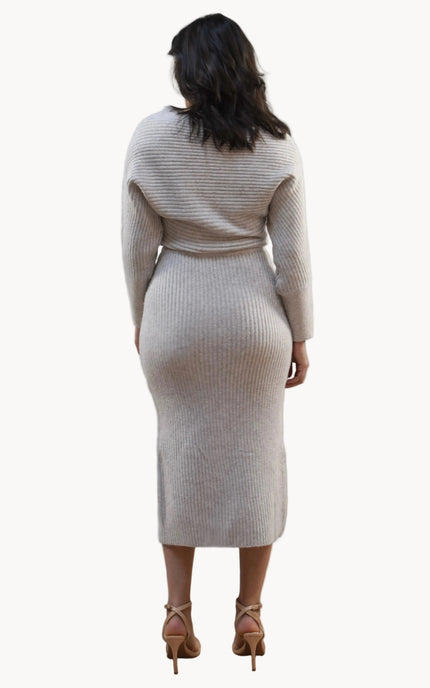 Midi one-shoulder sweater dress on soft linen background, featuring soft stretchy knit and elegant silhouette.