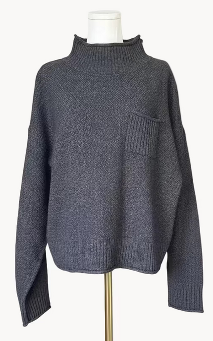 Mock neck long sleeve sweater top in a soft wool-blend knit with a simple, cozy silhouette, photographed on Soft Linen background.