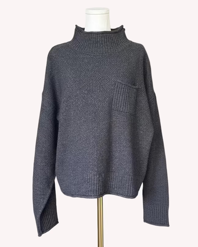 Mock neck long sleeve sweater top in a soft wool-blend knit with a simple, cozy silhouette, photographed on Soft Linen background.