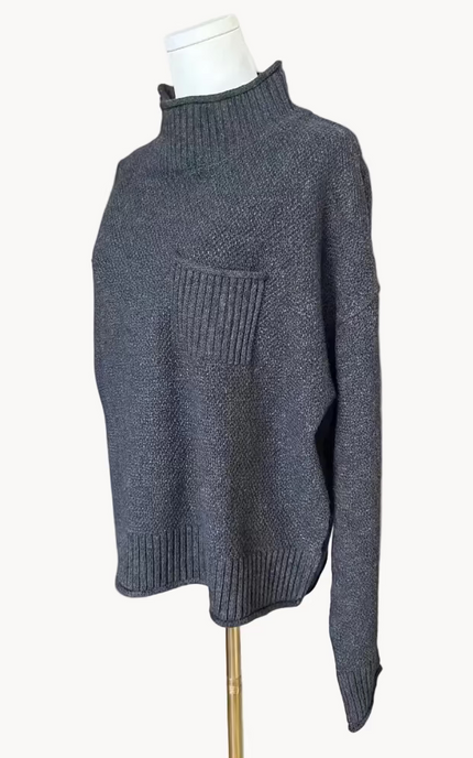 Mock neck long sleeve sweater top in a soft wool-blend knit with a simple, cozy silhouette, photographed on Soft Linen background.