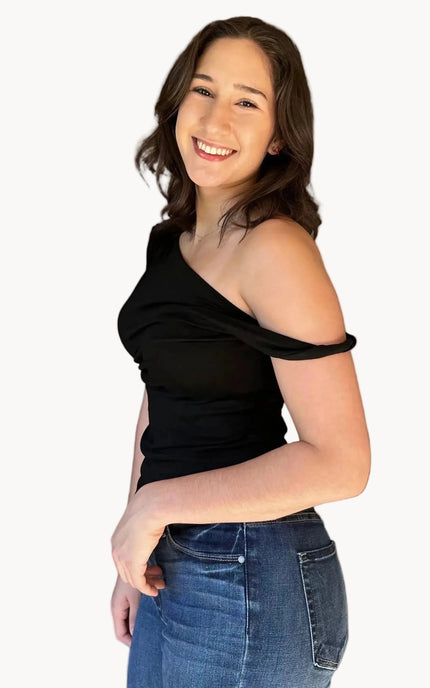 Asymmetrical off-shoulder knit top with twist front and fitted silhouette