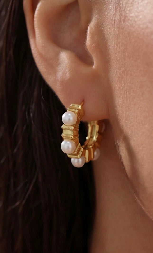 18k gold PVD stainless steel hoop earrings with soft glass pearl accents, lightweight hypoallergenic design.