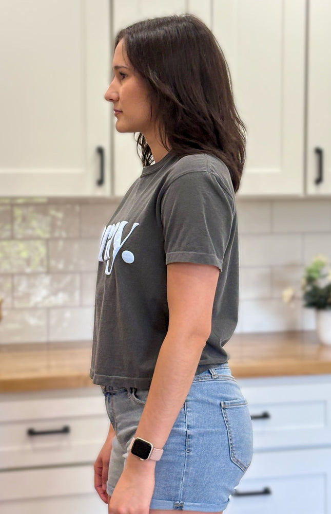 Charcoal gray cropped tee with bold ‘pray.’ text — modern faith graphic tee from Justyna Grace Boutique.