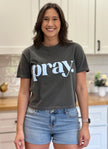 Charcoal gray cropped tee with bold ‘pray.’ text — modern faith graphic tee from Justyna Grace Boutique.
