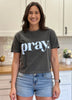 Charcoal gray cropped tee with bold ‘pray.’ text — modern faith graphic tee from Justyna Grace Boutique.