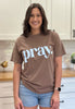 “Pray.” faith graphic tee with soft cotton fabric, textured print, and relaxed fit.