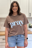 “Pray.” faith graphic tee with soft cotton fabric, textured print, and relaxed fit.