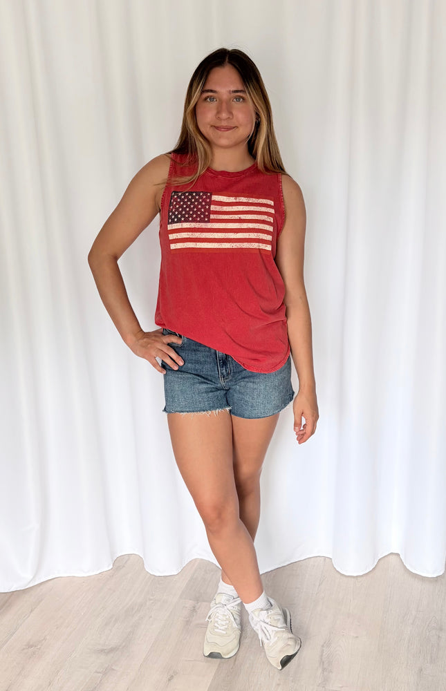 Cotton tank styled for casual weekend wear with denim