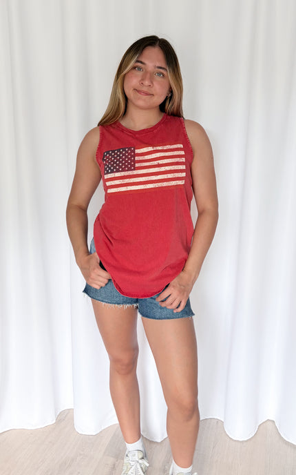 Model wearing premium cotton graphic tank top, size Small, showing true-to-size fit