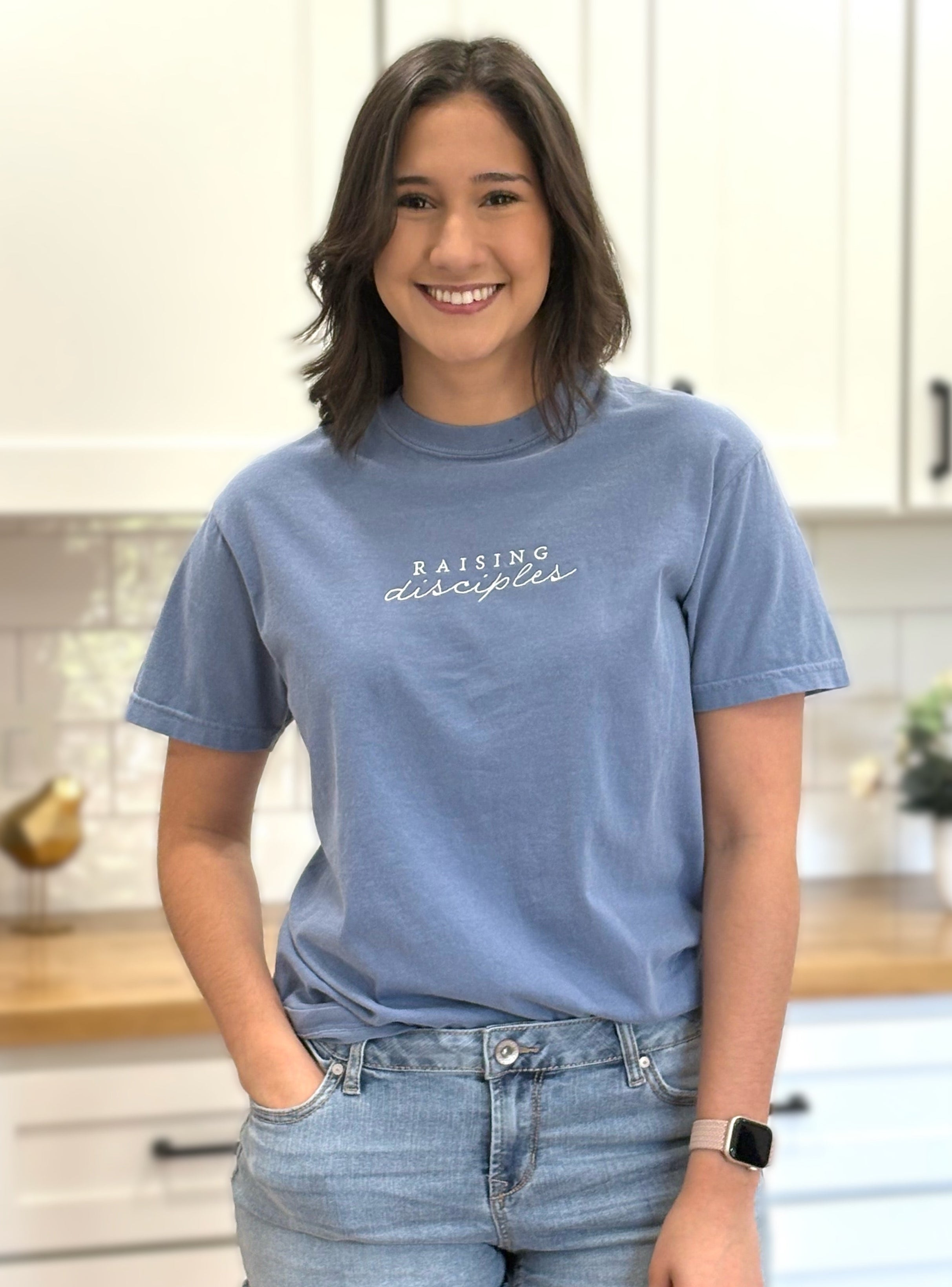 Comfort Colors “Raising Disciples” embroidered tee in soft cotton, vintage finish, and relaxed unisex fit.