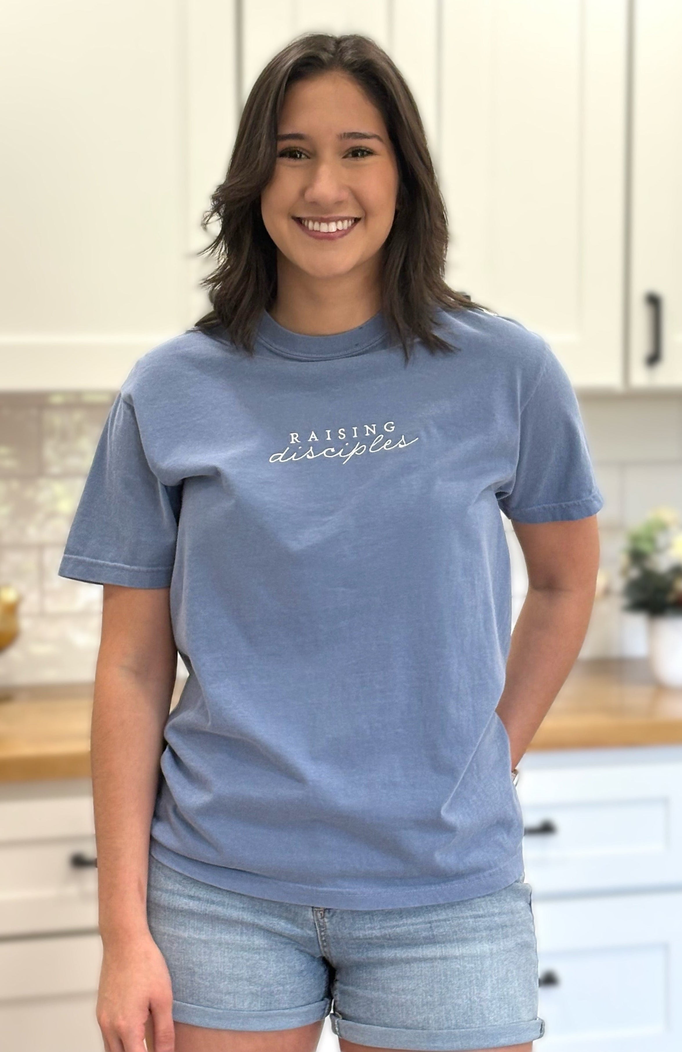 Comfort Colors “Raising Disciples” embroidered tee in soft cotton, vintage finish, and relaxed unisex fit.