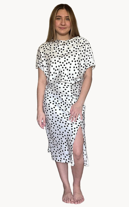 Renee C polka dot dress with side slit and flattering fitted silhouette