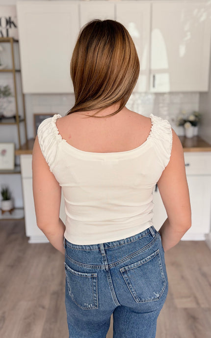 Back view of fitted ribbed tank showing ruched strap detail and clean back construction