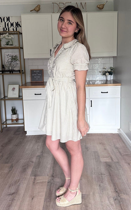 Side view of the Ruthie striped cotton mini dress showing ruffled doll collar and relaxed feminine fit