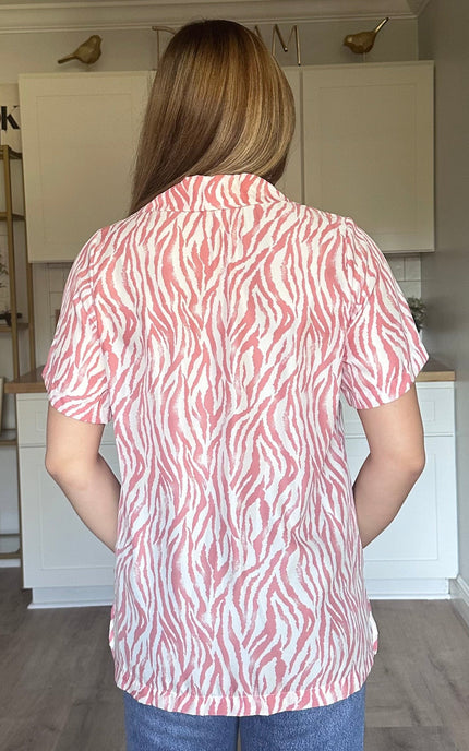 Safari Lines Polo featuring polo-style button neckline