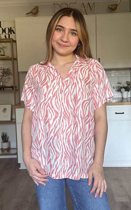 Safari Lines Polo coral zebra print blouse with short sleeves
