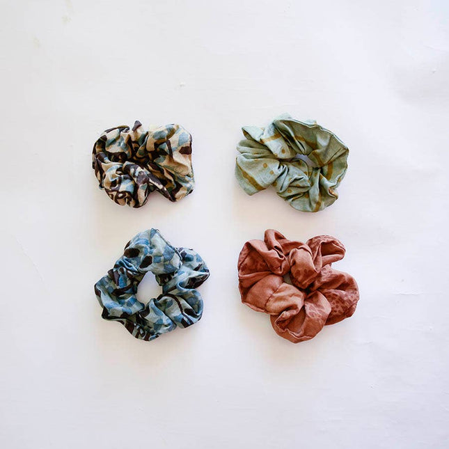 Hand-dyed satin finish scrunchies made from upcycled bandana fabric in soft earthy tones