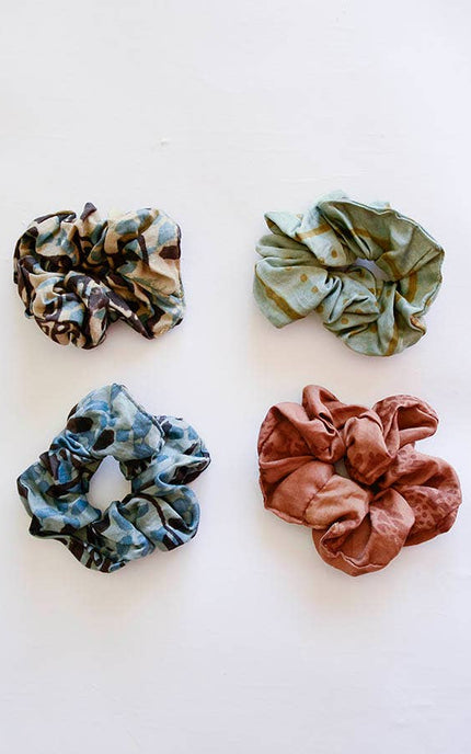 Hand-dyed satin finish scrunchies made from upcycled bandana fabric in soft earthy tones