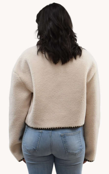 Cream Sherpa Stitch Jacket on soft linen background, featuring plush sherpa fabric and contrast stitching