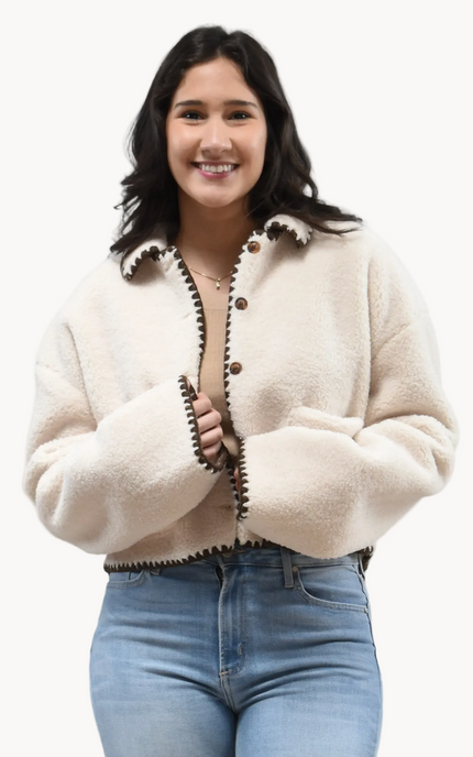 Cream Sherpa Stitch Jacket on soft linen background, featuring plush sherpa fabric and contrast stitching
