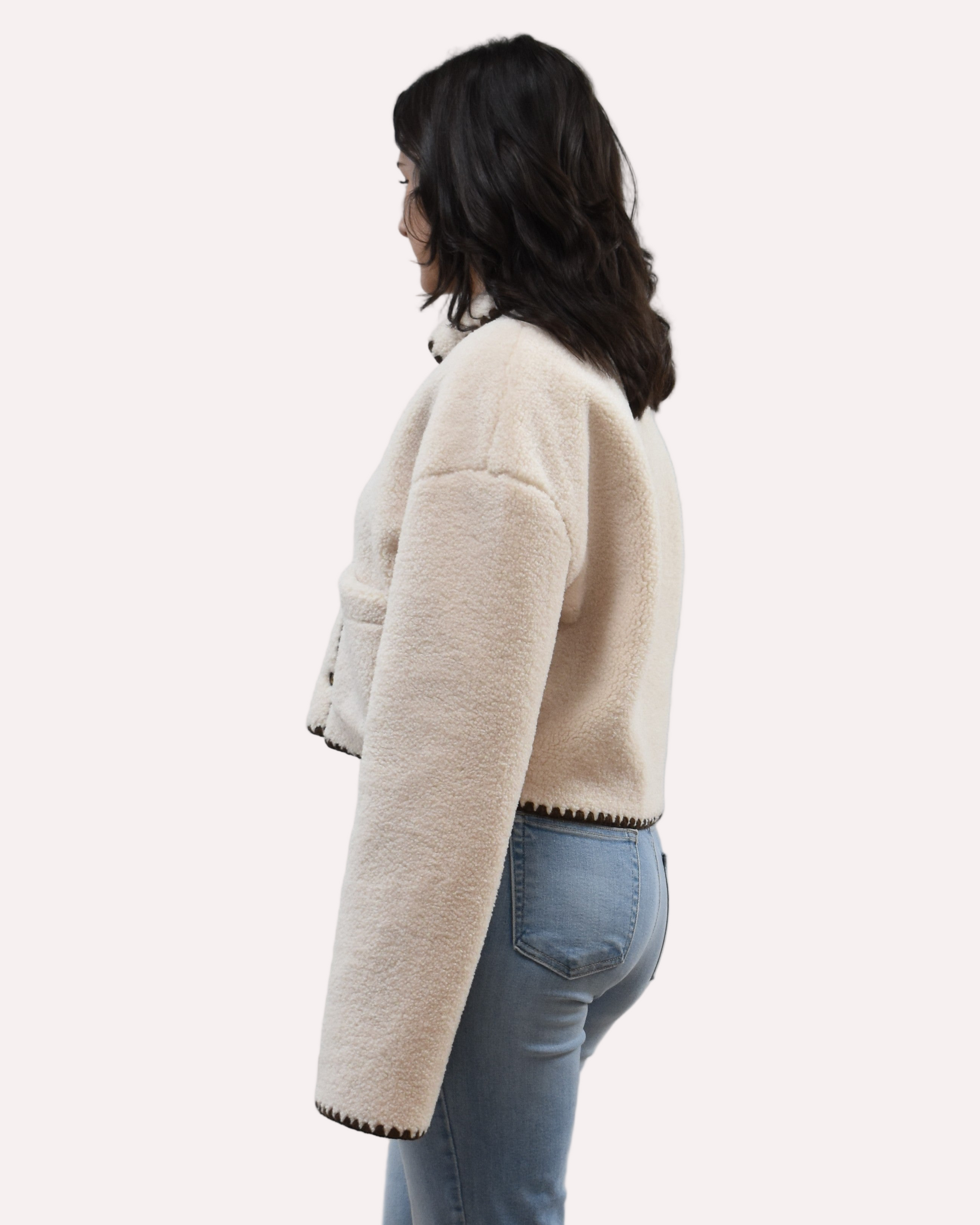 Cream Sherpa Stitch Jacket on soft linen background, featuring plush sherpa fabric and contrast stitching