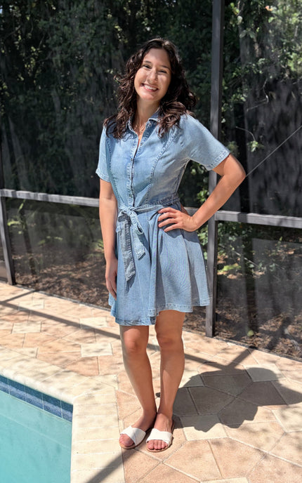 Profile of breathable Tencel shirt dress highlighting relaxed silhouette and self-tie waist