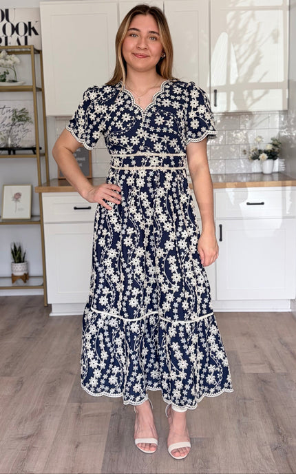 Sloane embroidered cotton midi dress with floral embroidery and flowy silhouette