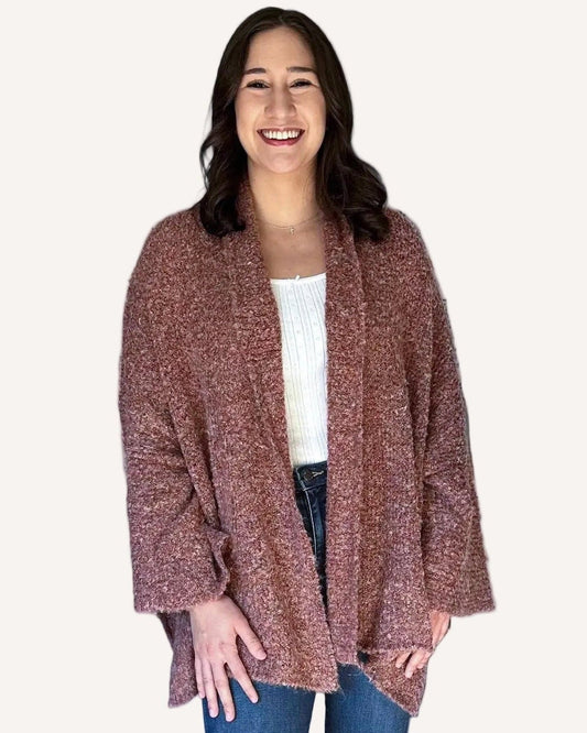 Soft stretch knit fabric with relaxed drape on open-front cardigan