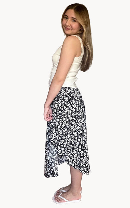 Smocked waist midi skirt styled for warm-weather wear