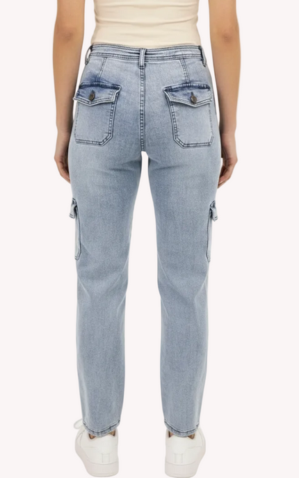 Soft Wash Cargo Jeans in light vintage aged blue wash – ultra-soft Tencel blend straight-leg high-rise denim with side cargo pockets – front view on soft linen background – Justyna Grace Boutique