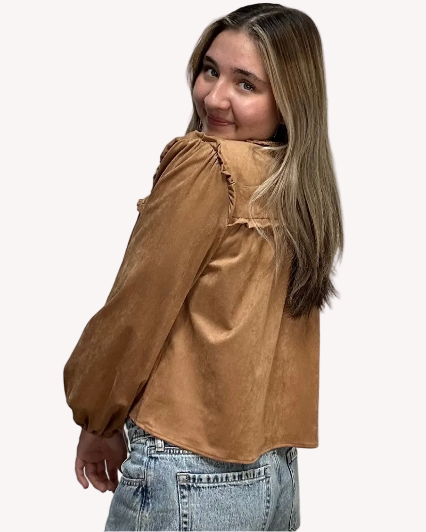 Brown suede-inspired cropped jacket top with ruffle trim, front cut-out, and balloon sleeves, shown on a soft-linen background for a cozy fall look.