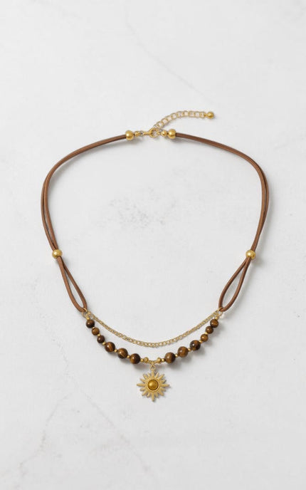 Full-length view of beaded sun necklace in deep, lasting 18K gold PVD