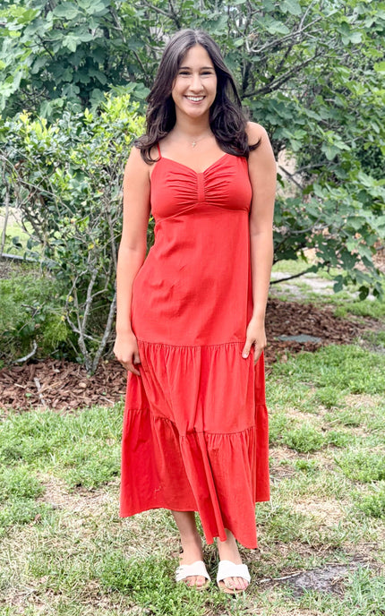 Summer cotton maxi dress featuring ruched bust detail and flowing tiered skirt