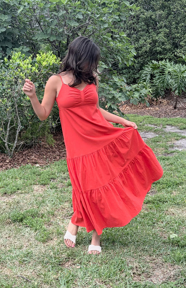 Cotton maxi dress in natural movement, showing fluid drape and silhouette