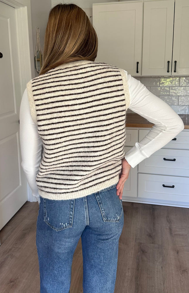 Sleeveless textured knit vest with soft wool-like finish