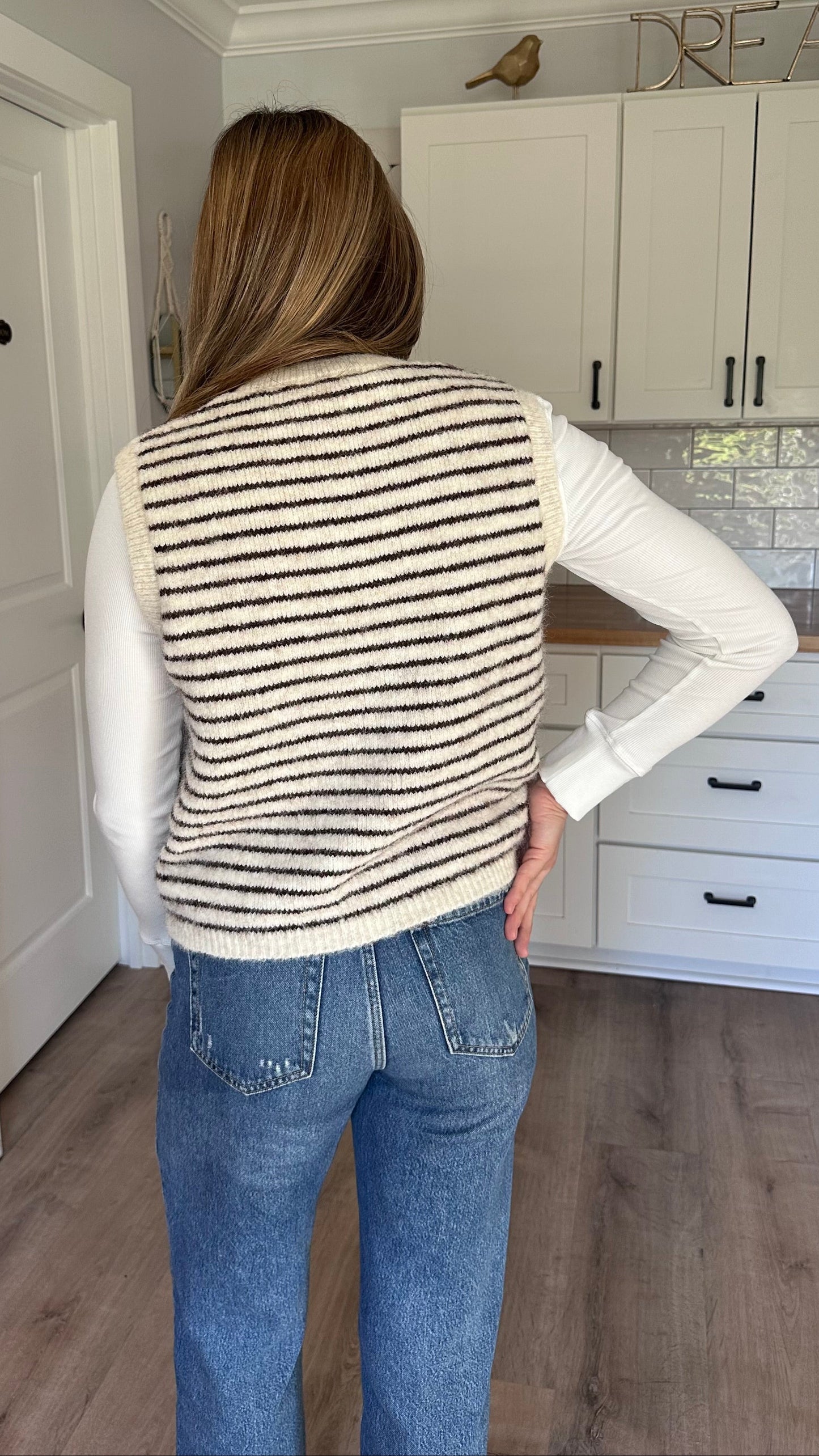 Sleeveless textured knit vest with soft wool-like finish