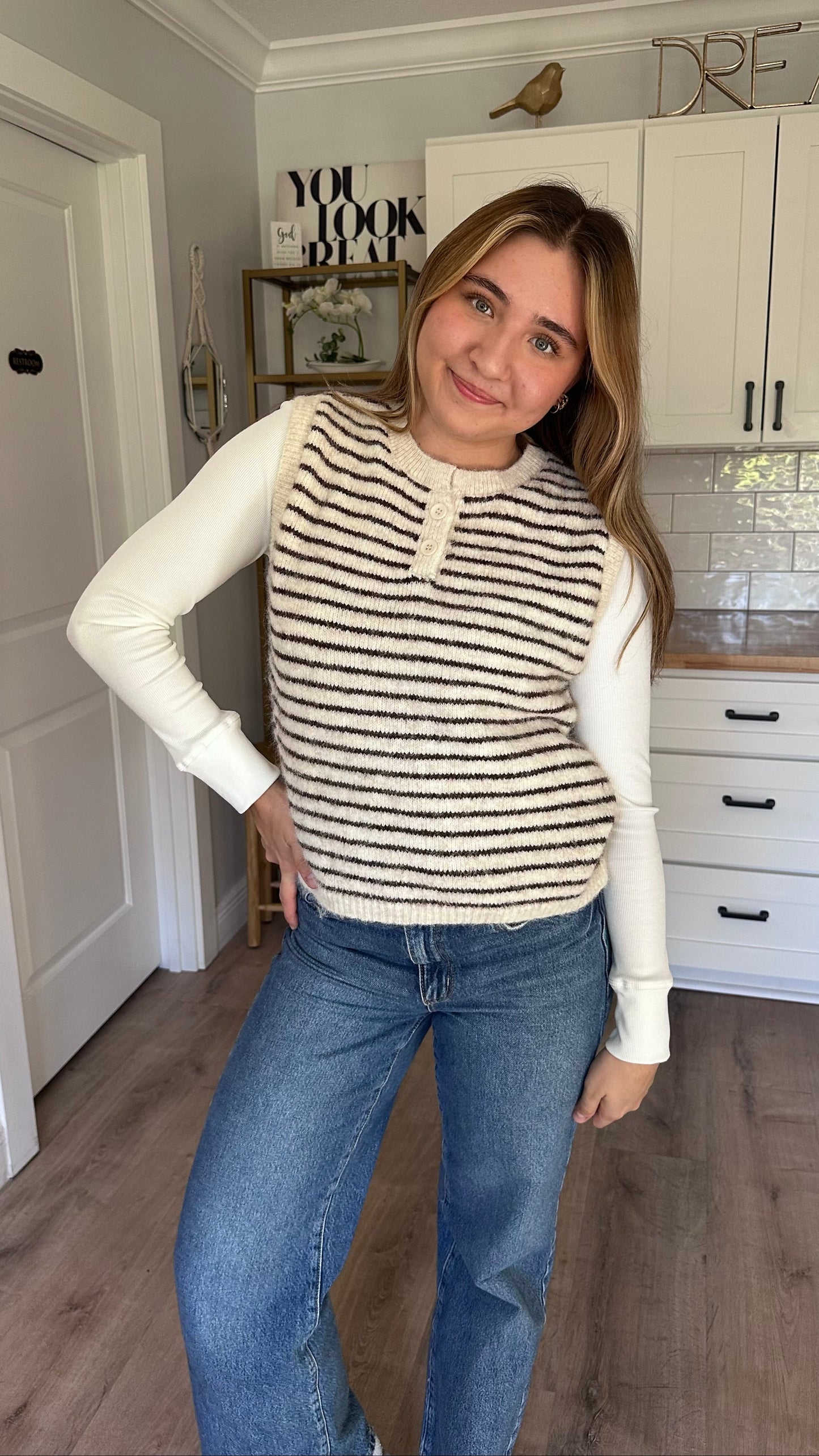 Textured knit button-front vest with relaxed sleeveless silhouette