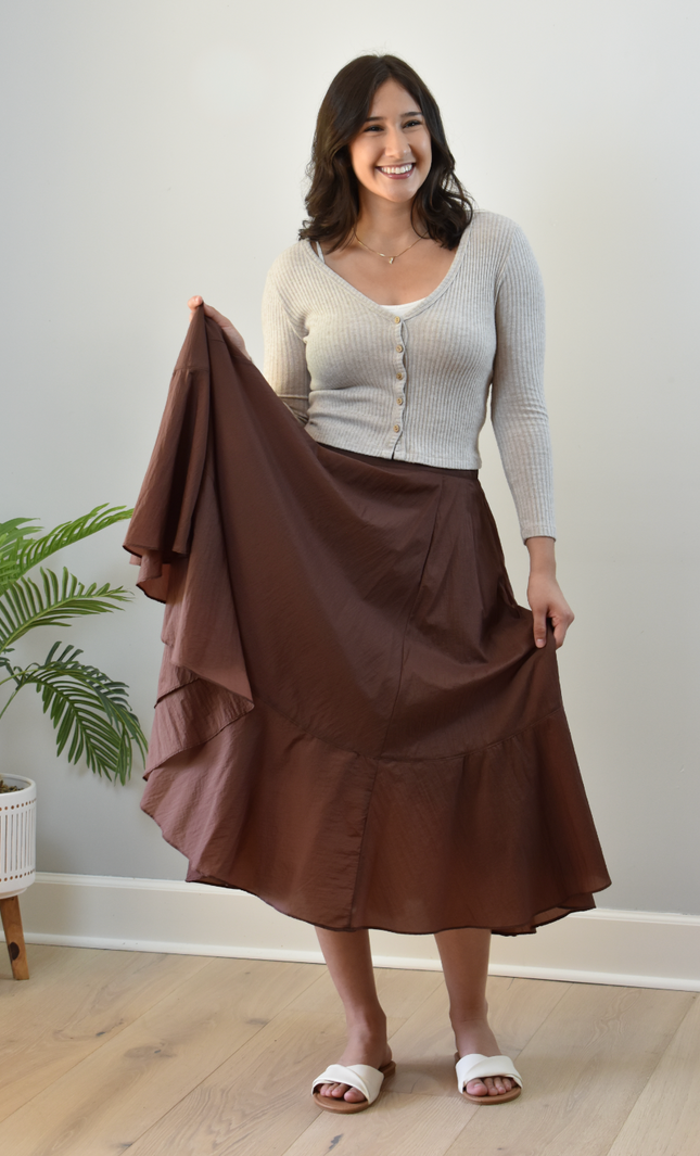 Tiered A-Line Midi Skirt — crisp structured midi with high-fitted waistband and gathered silhouette from Justyna Grace Boutique.