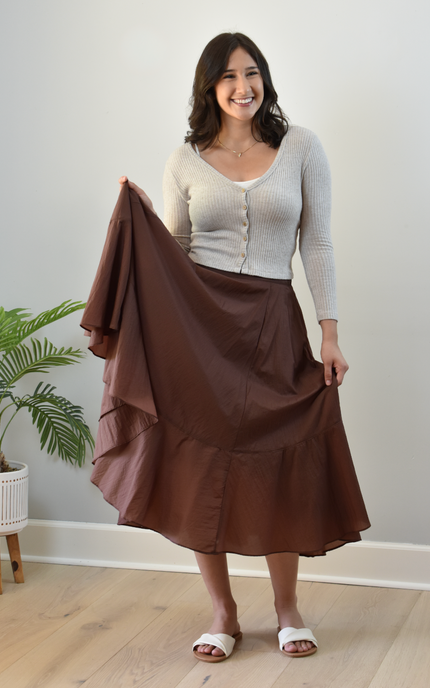Tiered A-Line Midi Skirt — crisp structured midi with high-fitted waistband and gathered silhouette from Justyna Grace Boutique.
