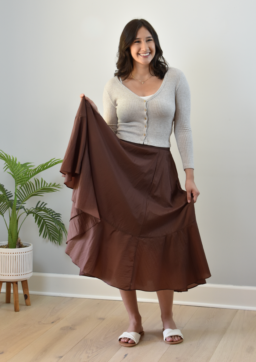 Tiered A-Line Midi Skirt — crisp structured midi with high-fitted waistband and gathered silhouette from Justyna Grace Boutique.