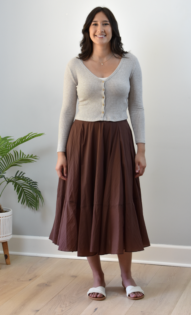 Tiered A-Line Midi Skirt — crisp structured midi with high-fitted waistband and gathered silhouette from Justyna Grace Boutique.