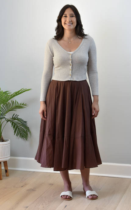 Tiered A-Line Midi Skirt — crisp structured midi with high-fitted waistband and gathered silhouette from Justyna Grace Boutique.
