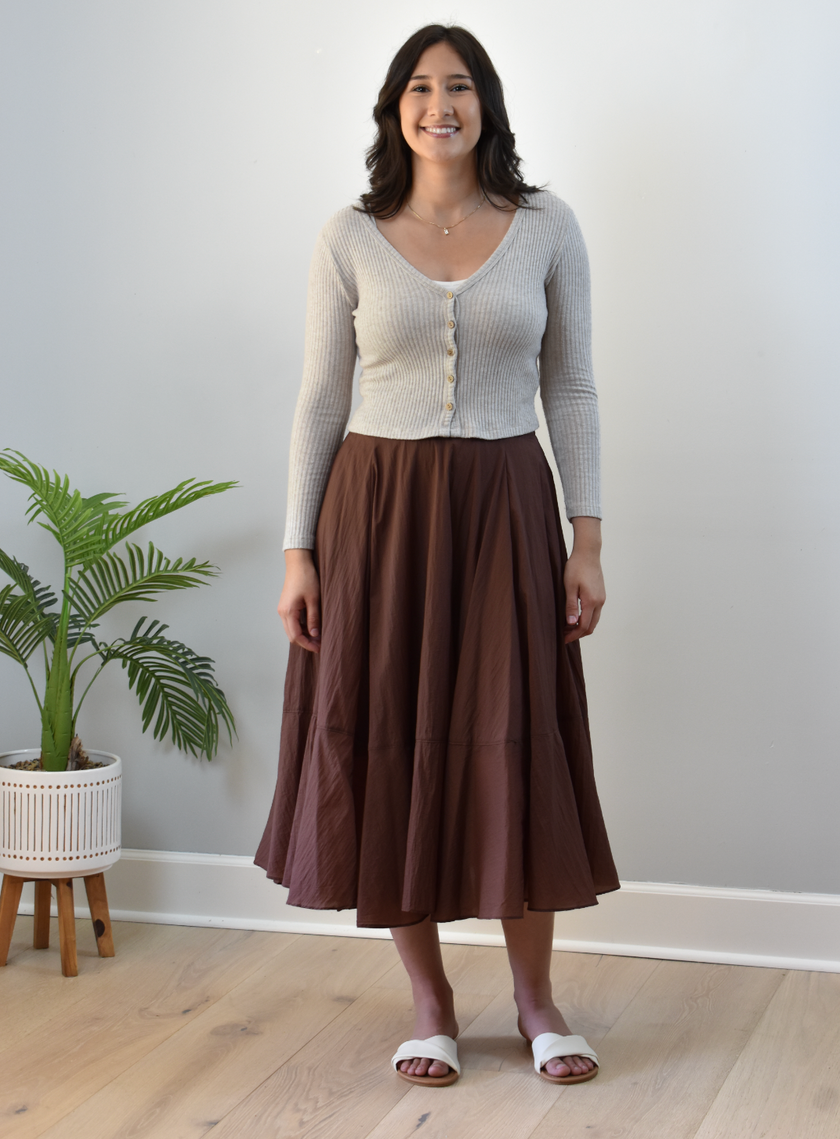 Tiered A-Line Midi Skirt — crisp structured midi with high-fitted waistband and gathered silhouette from Justyna Grace Boutique.