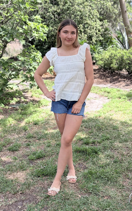 Flutter sleeve detail on tiered ruffle top