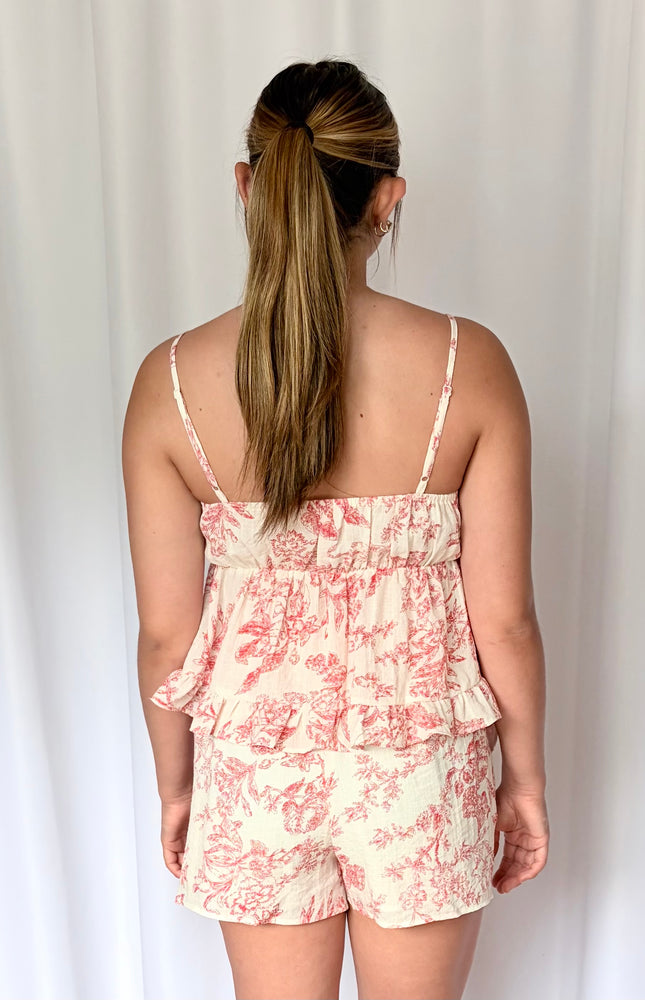 Toile-print matching set styled on model showing cami top and high-rise shorts with flowy viscose silhouette and self-tie waist detail