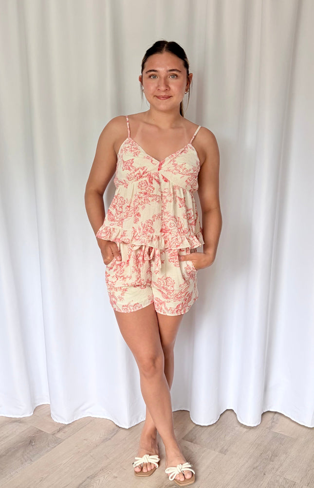 Side pocket detail on high-rise toile-inspired printed shorts in soft viscose blend