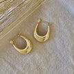 18k gold-plated U-shaped hoop earrings — modern minimalist waterproof stainless steel jewelry from Justyna Grace Boutique.