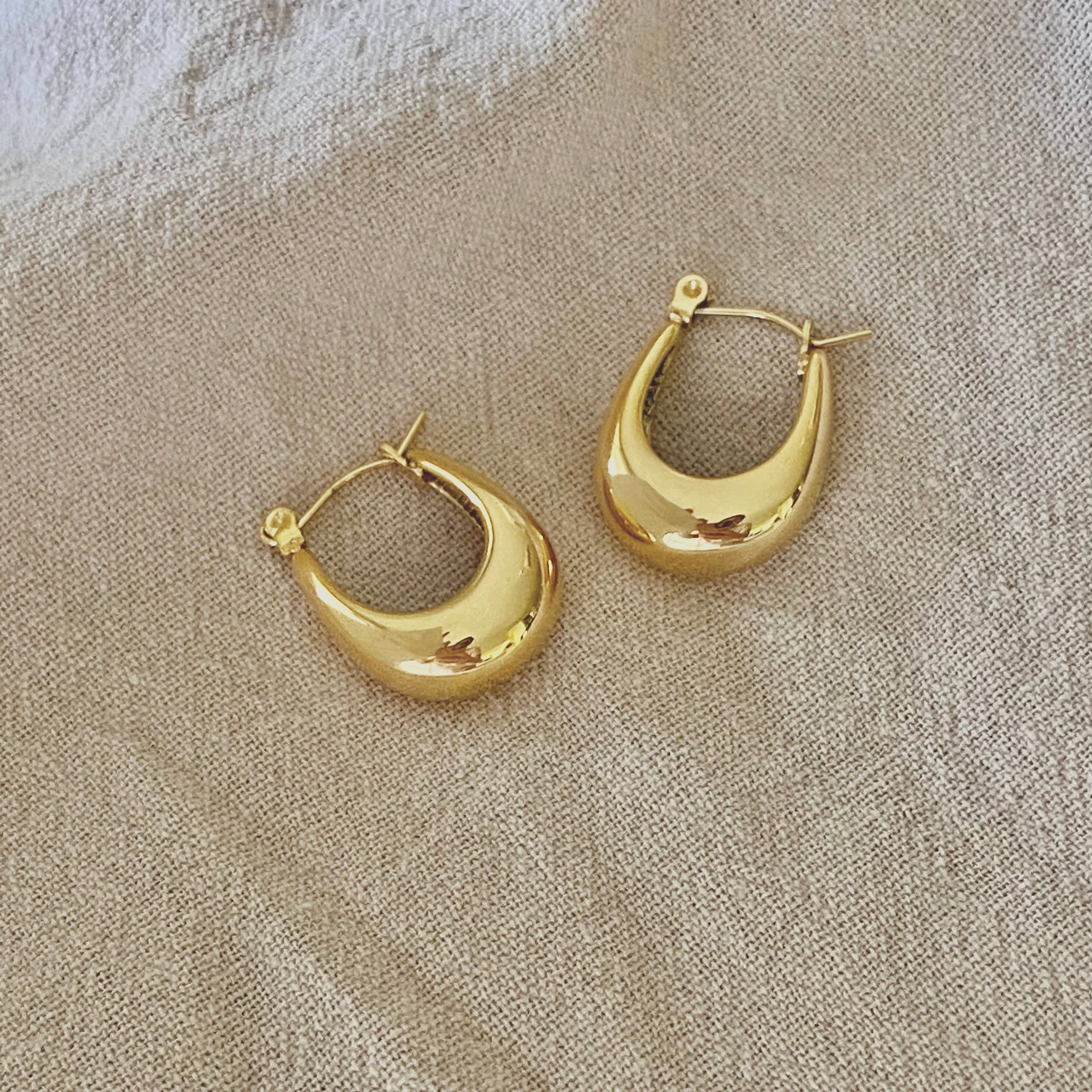 18k gold-plated U-shaped hoop earrings — modern minimalist waterproof stainless steel jewelry from Justyna Grace Boutique.
