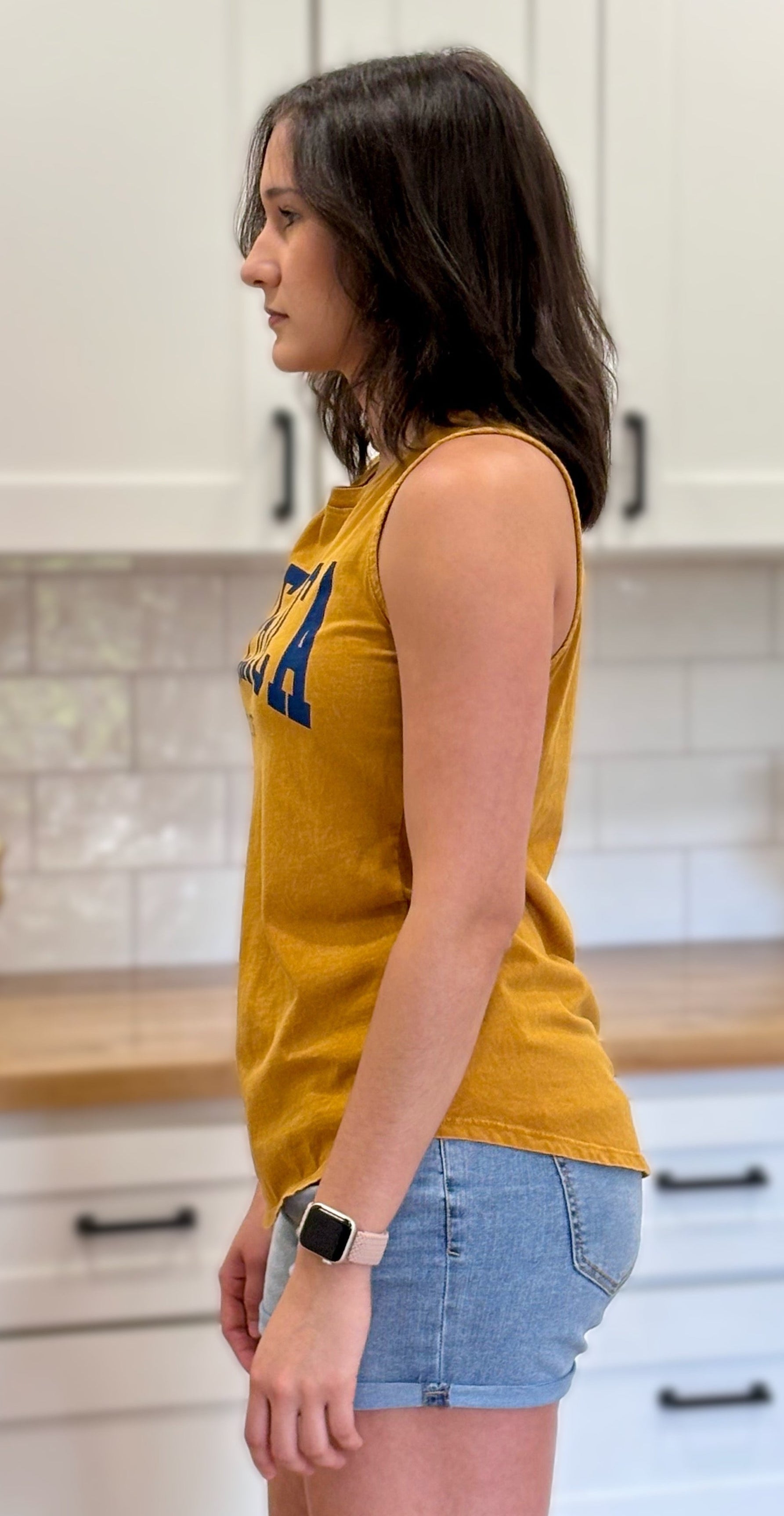 Mustard mineral-wash vintage Americana tank with soft cotton fabric and screen-printed graphic design